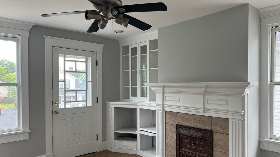 Finished living room remodel with fireplace and built-ins in Mason, Ohio